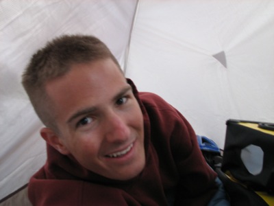 In the tent... one tired cyclist with 4 panniers... the bike has to wait outside - locked to a tree.